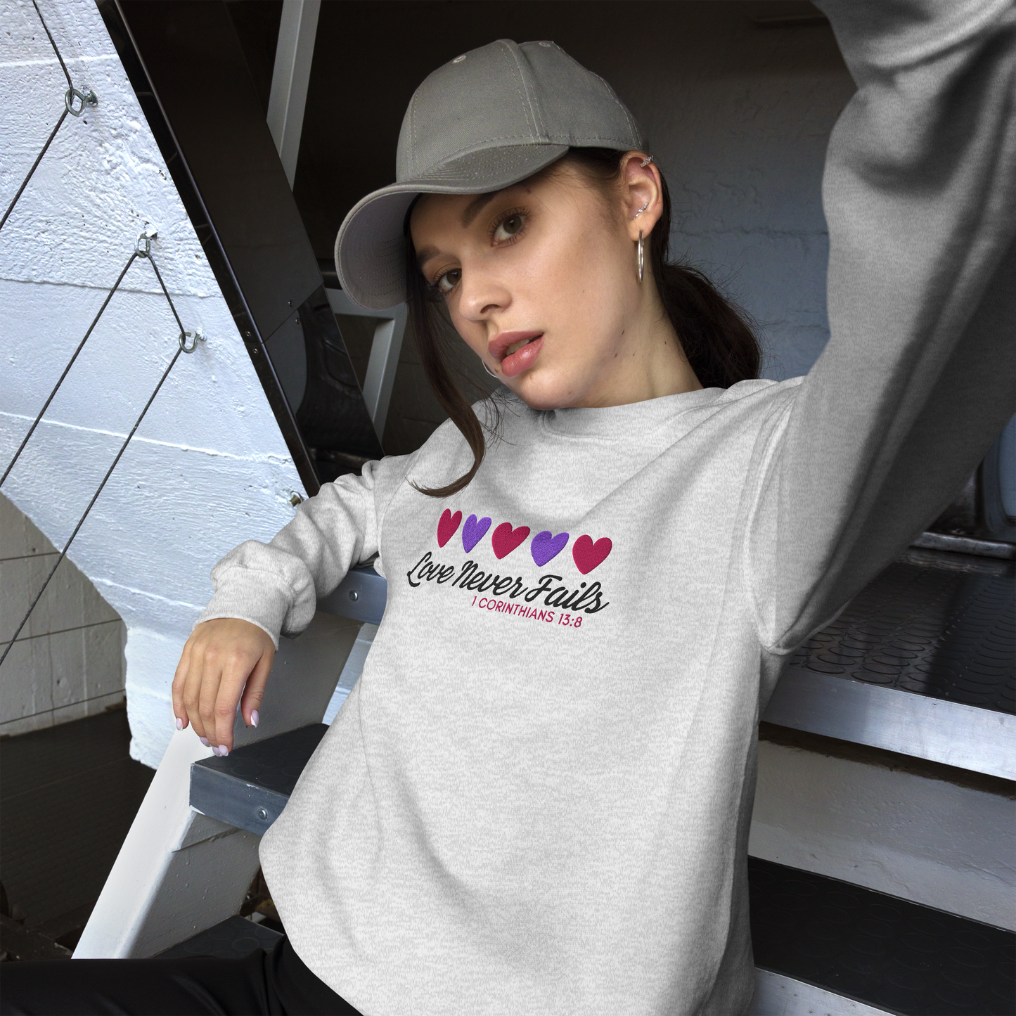Love Never Fails Embroidered Women's Sweatshirt