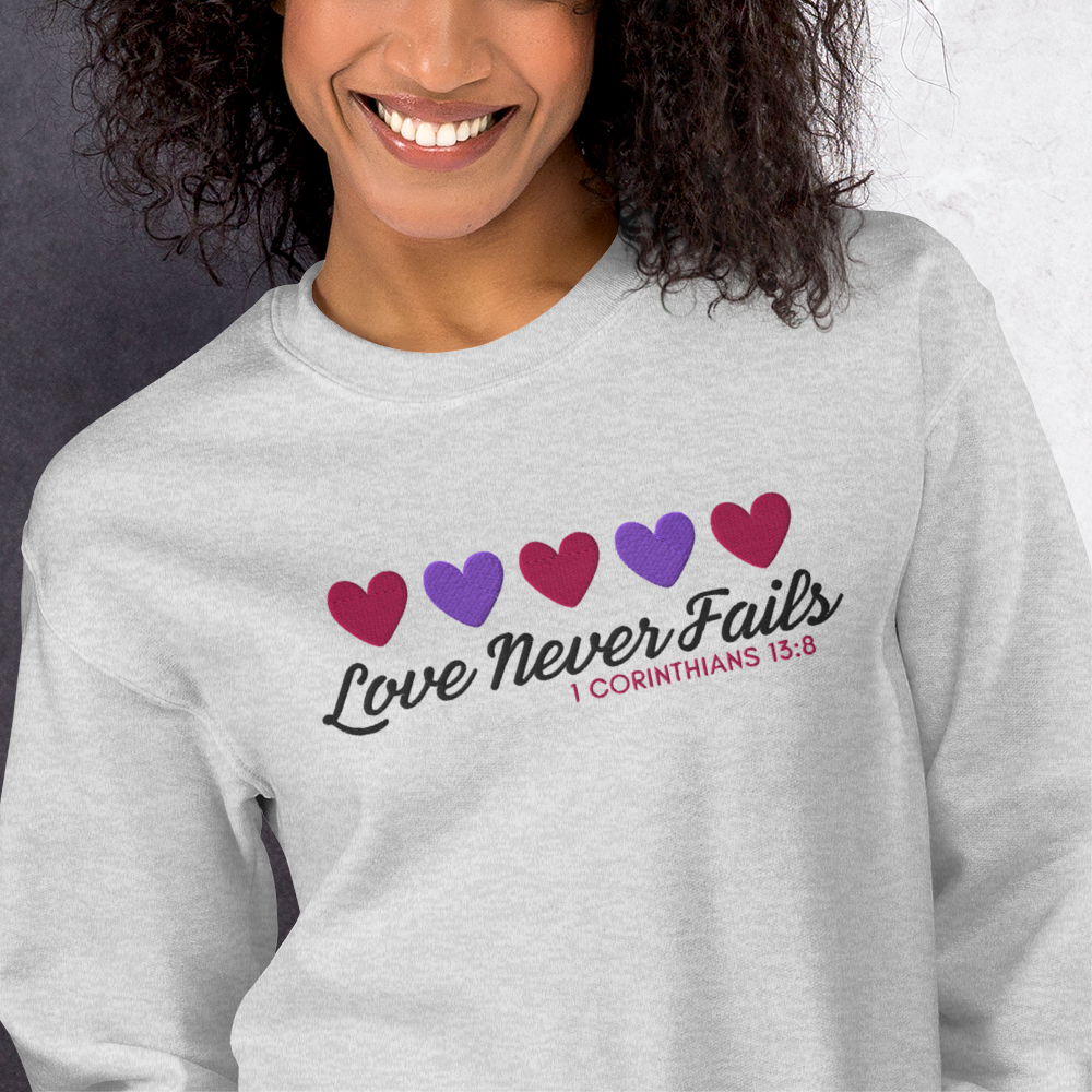 Love Never Fails Embroidered Women's Sweatshirt